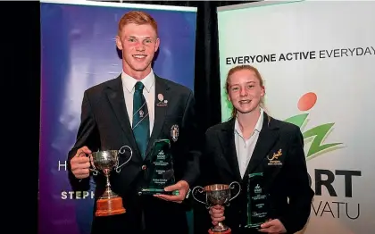  ??  ?? The supreme winners of the Manawatu¯ secondary schools sports awards Callum Crawley, left, and Kaitlyn Watts.