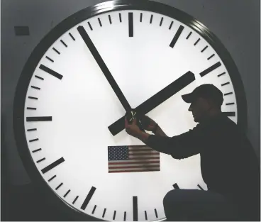  ?? Elise Amendola / THE CANADIAN PRESS / AP files ?? In 2007, Canada and the United States extended the duration of daylight saving time by around four to five weeks.