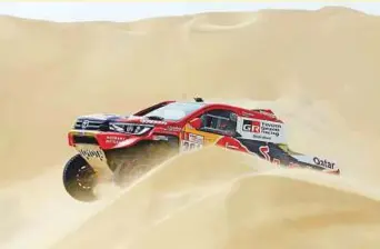 ?? AP ?? Toyota’s Qatari driver Nasser Al Attiyah and co-driver Matthieu Baumel of France in action during the first stage of the 2018 Dakar Rally between Lima and Pisco, Peru, on Saturday.