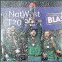 ??  ?? CHAMPIONS Notts lift the trophy after winning final