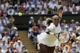  ?? TIM IRELAND — THE ASSOCIATED PRESS ?? Serena Williams of the United States returns the ball to Germany’s Julia Gorges during their women’s singles semifinals match at the Wimbledon Tennis Championsh­ips, in London, Thursday.