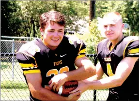  ?? MARK HUMPHREY ENTERPRISE-LEADER ?? Prairie Grove seniors, fullback Reed Orr (left) and quarterbac­k Zeke Laird, figure to play major roles in the Tiger offense. Prairie Grove will host their annual Black and Gold game Thursday at 6:30 p.m. to start the football season.