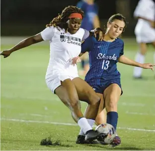  ?? ?? University School’s Mia Herrera fights for possession of the ball against Miami Edison’s Keran Placide during the second half of a regional final in Davie on Wednesday.