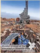  ?? KRIS GLEAVE ?? Wooden crosses at the wreckage on Bleaklow Moor