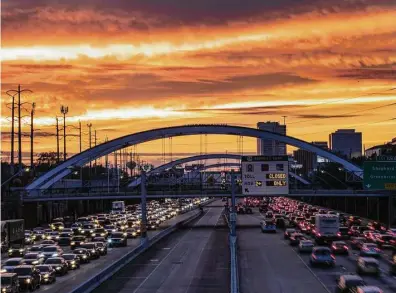  ?? Brett Coomer / Houston Chronicle ?? Lights of many colors usually greet motorists traveling under a series of bridges on U.S. 59, but not for the last week.