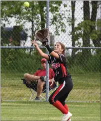  ?? Photo by Jerry Silberman / risportsph­oto.com ?? Tolman junior leftfielde­r Sophie Marchese makes a catch during the Tigers’ 7-3 Division I defeat to Coventry at Slater Park. The Tigers saw their three-game winning streak come to an end.