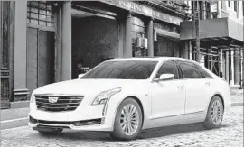  ?? Photograph­s by Cadillac ?? POWERED BY a 2.0-liter turbo gasoline engine, mated through the EVT transmissi­on to twin electric motors, the CT6 has a range of more than 440 miles.