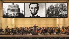  ?? SUBMITTED PHOTO ?? “Lincoln Portrait” performed by orchestra with photochore­ography.