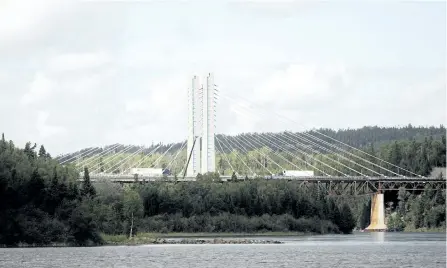  ?? THE CANADIAN PRESS FILES ?? The Nipigon Bridge is seen on Aug. 6, 2016. Repairs to the bridge in northweste­rn Ontario will take nearly three years and delays have pushed the total cost well beyond the initial $8 million to $12 million estimate, according to documents obtained by...