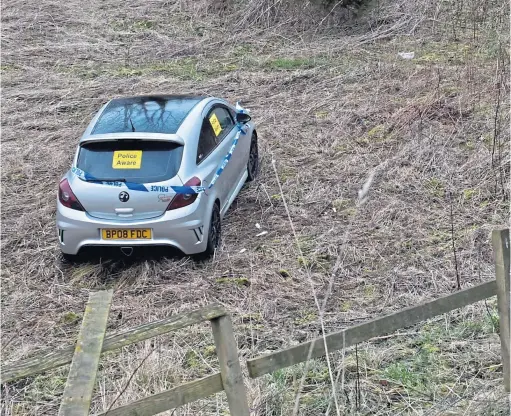  ??  ?? ACCIDENT: A Vauxhall Corsa went down an embankment at Low Wood Road and the driver was taken to hospital after the incident