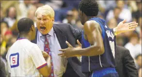  ?? Eric Gay / Associated Press ?? Dallas Mavericks coach Don Nelson, center, and guard Michael Finley ( 4) argue a call during a game against the Spurs in San Antonio, Texas, in April 2002.