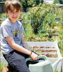  ?? ANN CAMERON SIEGAL / WASHINGTON POST ?? Since December, J.P. Mackey has raised more than $2,700 for Heifer Internatio­nal by creating and selling “bee bracelets.”