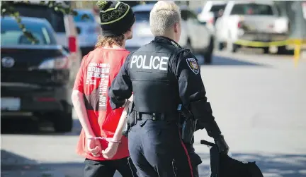  ?? ASHLEY FRASER ?? Ottawa police arrested five store clerks at Cannabis Culture on Bank Street on Tuesday.