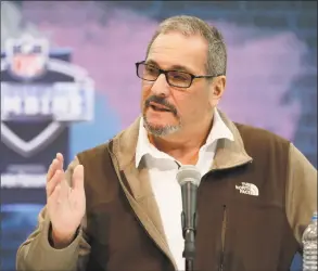  ?? Michael Conroy / Associated Press ?? New York Giants general manager Dave Gettleman speaks during a press conference at the NFL scouting combine in February.