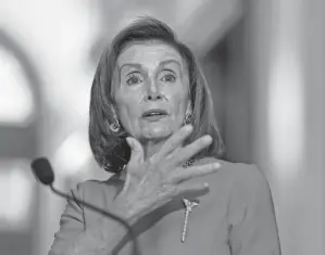  ?? J. SCOTT APPLEWHITE/AP ?? House Speaker Pelosi has promised centrists a vote on the more modest $1 trillion public works package.