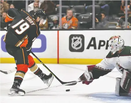  ?? GARY A. VASQUEZ-/USA TODAY SPORTS FILES ?? The Anaheim Ducks' Troy Terry, seen here moving in for a shot against the Arizona Coyotes' Connor Ingram at the Honda Center in Anaheim on Jan. 28, says he favours extending 3-on-3 play in order to settle a game, even though he excels in shootouts.