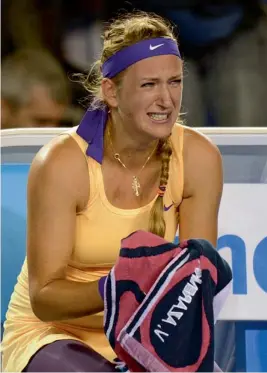  ??  ?? Belarus’ Victoria Azarenka reacts after her Australian Open women’s singles final win over Li Na of China in Melbourne on Saturday.