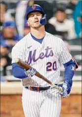  ?? Sarah Stier / Getty Images ?? Pete Alonso reacts after striking out during the eighth inning of the Mets’ loss to the Atlanta Braves on Monday. Alonso was 0-for-4 with a pair of strikeouts Monday.