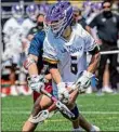  ?? James Franco / Times Union archive ?? UAlbany faceoff specialist Regan Endres went 17-for-25 with 10 ground
balls in Saturday’s defeat.