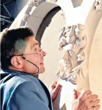  ?? ?? Knight inspects his effigy at Lincoln Cathedral, 140 feet up on the ‘Dean’s Eye’ rose window