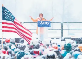  ?? Kerem Yucel / AFP / Getty Images ?? Sen. Amy Klobuchar, D-Minn., announces her candidacy for president in Minneapoli­s: “I don’t have a political machine. I don’t come from money. But what I do have is this: I have grit.”