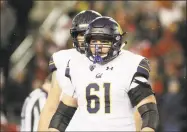  ?? Young Kwak / Associated Press ?? California offensive lineman Valentino Daltoso stands on the field during the second half against Washington State in 2018.