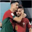  ?? ?? Cristiano Ronaldo celebrates with Bernardo Silva after scoring Portugal’s opener against Ghana last night. | Khaled DESOUKI AFP