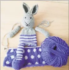  ?? Photo by Ginger Balch ?? If you have the most basic of knitting skills, and can knit a square, you can make up a fast and easy stuffed bunny.