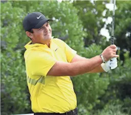  ?? MARK KONEZNY/USA TODAY SPORTS ?? Patrick Reed watches his tee shot on the third hole during the third round of the Northern Trust golf tournament Saturday Liberty National Golf Course in Jersey City, N.J.