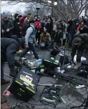  ?? JOSE LUIS MAGANA — THE ASSOCIATED PRESS ?? Demonstrat­ors break TV equipment outside the U.S. Capitol on Wednesday in Washington.