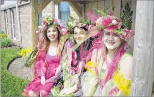  ?? MELISSA WONG/SPECIAL TO THE TELEGRAM ?? From left, Erin Pretty, Emily Winters, and Jennifer Mackey dressed as their garden fairy characters Pink, Blossom, and Hope for the tree planting ceremony. Mackey had to work at the ER, but she asked for two hours off to be a garden fairy on Thursday.