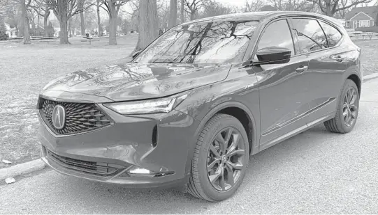  ?? MARK PHELAN/DETROIT FREE PRESS ?? The 2022 Acura MDX is longer, wider and less tall.