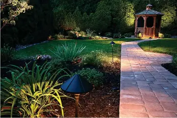  ?? Submitted photo ?? ■ Landscape lighting is worth exploring for homeowners looking to upgrade their properties.