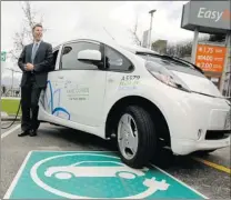  ?? ARLEN REDEKOP/ PNG ?? Mayor Gregor Robertson said an $ 800,000 pilot project to create more places for vehicles to plug in is part of Vancouver’s plan to become Canada’s most electric- vehicle- ready city.