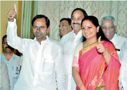  ?? DC ?? Chief Minister K.T. Rama Rao along with his daughter and Nizamabad MP K. Kavitha thanks supporters at the Pragathi Bhavan on Friday after the TRS-affiliated TBGKS posted big win in the Singareni union elections. —