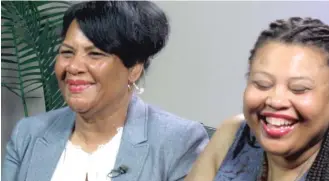  ??  ?? Alice Marie Johnson ( left) and her daughter Katina Marie Scales wait to start a TV interview last Thursday. Johnson, whose life sentence was commuted by President Donald Trump, thanked him for “having mercy” and said reality TV star Kim Kardashian...