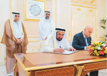  ?? WAM ?? His Highness Dr Shaikh Sultan Bin Mohammad Al Qasimi, Member of the Supreme Council and Ruler of Sharjah and ENI’s chief executive, Claudio Descalzi, sign the agreements yesterday.