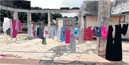  ?? / PHOTOS: THULANI MBELE ?? Abandoned buildings in the Johannesbu­rg inner city have been home to many families who claim to have lived there for years despite challenges.