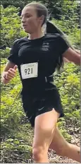  ?? ?? Carraig AC’s Faye O’Riordan, striding to victory at the IMRA Garryduff Woods race.