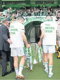  ?? ?? Tom Rogic and Nir Bitton head for the dressing room