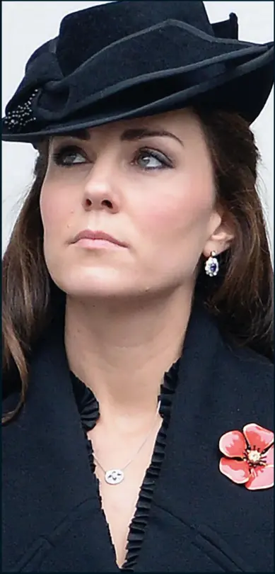  ??  ?? A time for reflection: The Duchess of Cambridge lost in thought during the ceremony