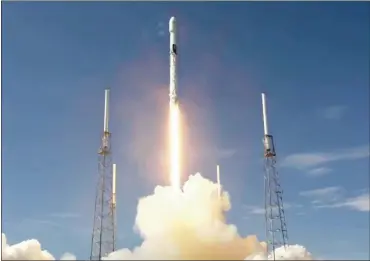  ?? SPACEX ?? Hawthorne-based SpaceX set a record for the reuse of its workhorse Falcon 9 rockets when it launched another batch of internet satellites into orbit recently. SpaceX took in $1.9 billion in new funding this month with plans to raise more.