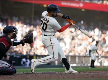  ?? NHAT V. MEYER — BAY AREA NEWS GROUP ?? The Giants' David Villar hits a game-winning single against the Arizona Diamondbac­ks during a game last season.