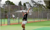  ?? ?? Okaiawa player Jorja Symes worked hard but was beaten by Karen Cranston.
Okaiawa player Hamish Mead lines up a serve.