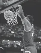  ?? TODAY SPORTS RICK OSENTOSKI/USA ?? Michigan State guard Tyson Walker dunks the ball in the second half against Marquette.