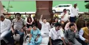  ?? PTI ?? AAP MP Sanjay Singh and TMC MPs protest at Parliament House during ongoing Monsoon Session, in New Delhi on Thursday