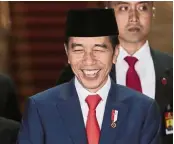  ?? — AP ?? The former furniture maker from Central Java was the first president to come from outside Indonesia’s elite or military and was returned to office following a landslide election win in April.