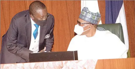  ?? PHOTO: PHILIP OJISUA ?? President Muhammadu Buhari ( right) and National Security Adviser to the President, Gen. Babagana Monguno during the Federal Executive Council meeting at the State House, Abuja… yesterday.