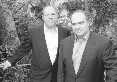  ?? Al Seib Los Angeles Times ?? HARVEY WEINSTEIN, left, and brother Bob Weinstein own 42% of Weinstein Co. They were co-chairmen until Harvey was fired Oct. 8.