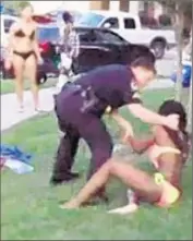  ?? Sky News ?? A STILL IMAGE from a bystander’s video shows Officer Eric Casebolt subduing a 14-year-old girl at a pool party Friday in McKinney, Texas.